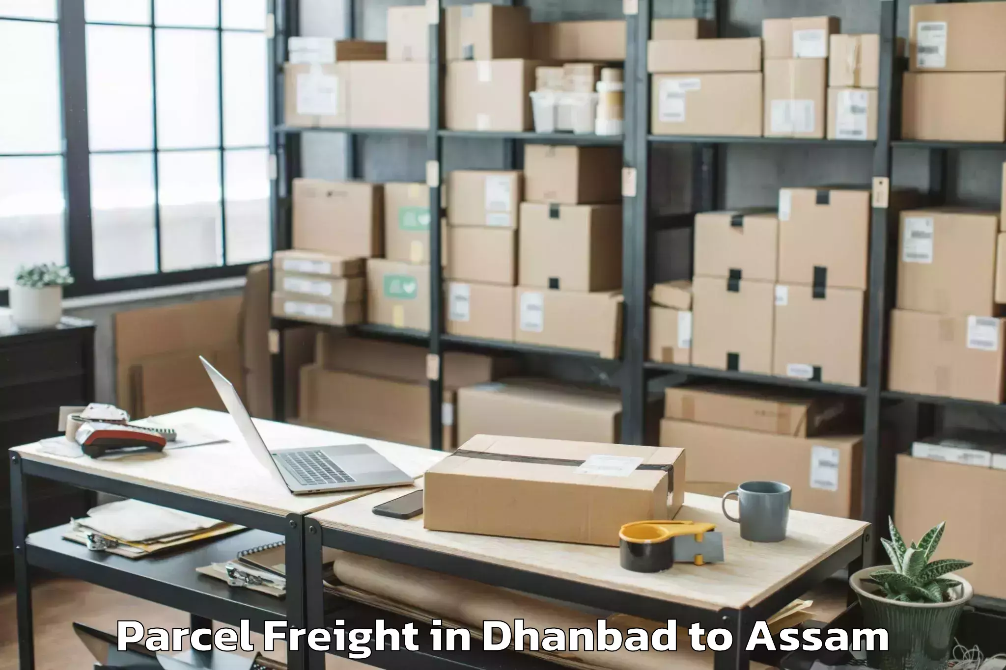 Book Your Dhanbad to Rowriah Airport Jrh Parcel Freight Today